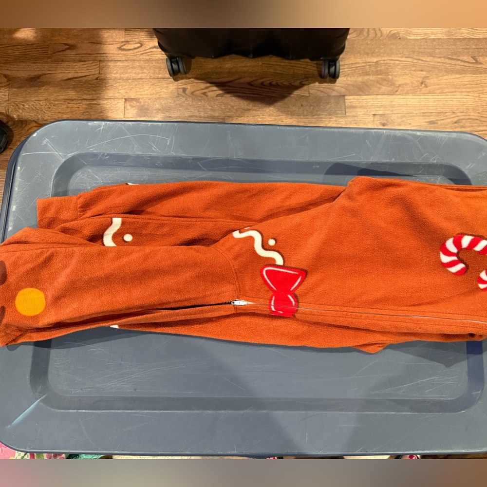 Orange Onesie with Candy Cane Design